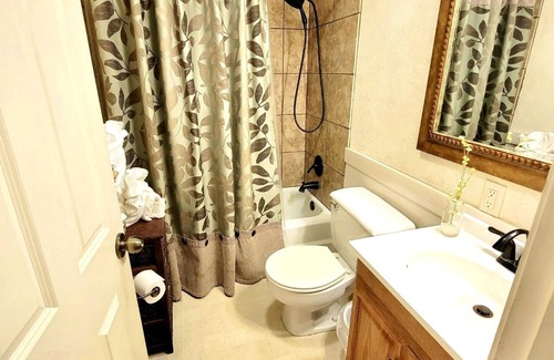 Mount Ida Apartment | Lake View Queen Guest Room With Two Queens, Sleeper Sofa And Patio Overlooking Lake Ouachita. 1 Bedroom Hotel Room by RedAwning