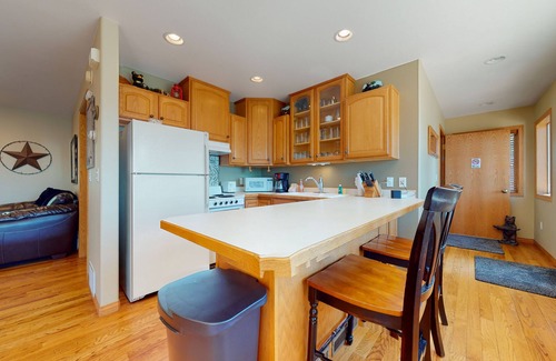 Woods Bay Cabin | Lakefront getaway with dock, 400- square-foot deck, close to town