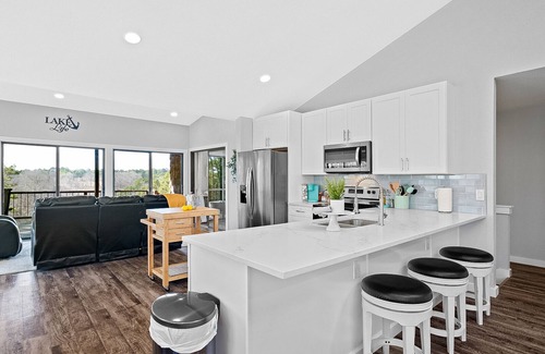 Beaver Shores House | Lakefront home with a game room, washer/dryer, central AC & firepit