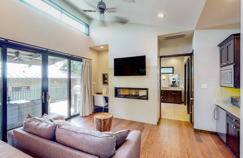 Spicewood Cabin | Lakeside cabin with outdoor kitchen/dining, firepit, WFH desk, soaking tub