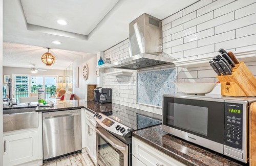 Sunset Beach Condo | Land's End 403 building 5 TOP Floor -Remodeled, Panoramic Water Views