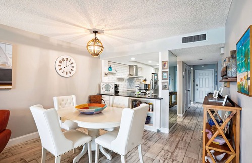Sunset Beach Condo | Land's End 403 building 5 TOP Floor -Remodeled, Panoramic Water Views
