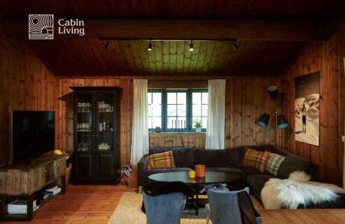 Nes House | Large cabin at Nesfjellet with lovely view, inddor Jacuzzi & sauna
