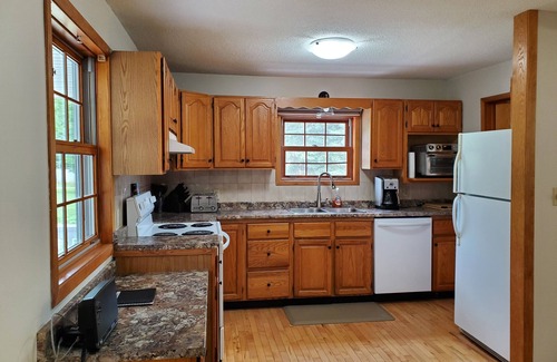Algoma District Cottage | Large farmhouse style cottage located on three acres of waterfront property.