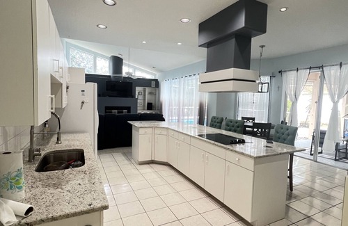 Greater Northdale House | Large home close to St. Peter beach and Clearwater beach, close by bush garden.