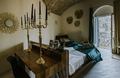 Sasso Caveoso Apartment | Lo Scorcio suite con vista sui Sassi