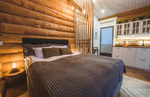 Rovaniemi House | Log Cabin with Private Sauna and Hot Tub by Invisible Forest Lodge & Spa