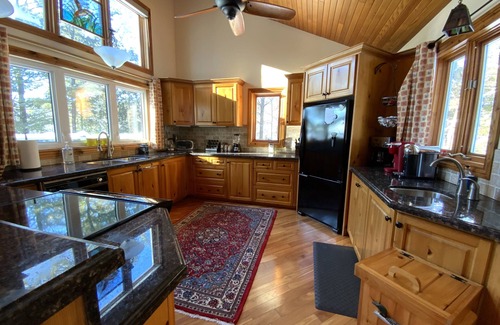 Windermere Cottage | Log home & guest cottage in old forest, Waterfall, Sunsets, Sauna, Fishing Boat