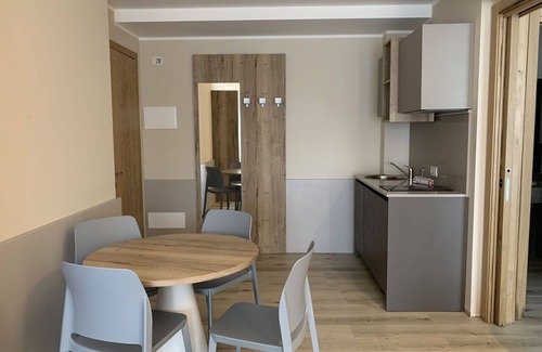Corno Apartment | Lovely apartment for 4 guests with WIFI, A/C, pool, TV and patio