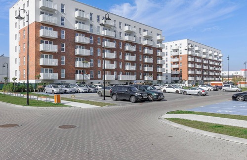 Lodz Apartment | Lumina modern studio with balcony