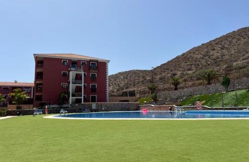 Palm-Mar Apartment | Luminoso y Elegante, piscinas y pistas de pádel