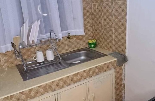 Nairobi House | Lux Suites Red Plate Studio Apartments