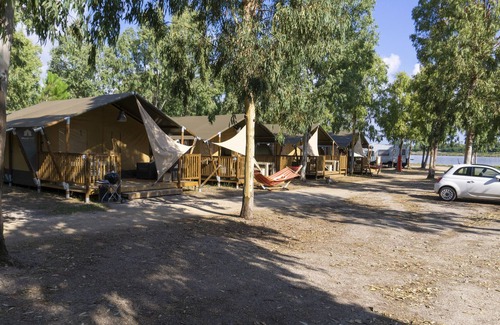 Fertilia Ski Chalet | Luxe Sanitary 5 pers. Villatent in Sardinia with Spray Park and Near at Beach