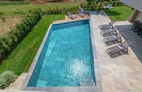 Banjole Villa | Luxury beachside villa with a pool and a sea view