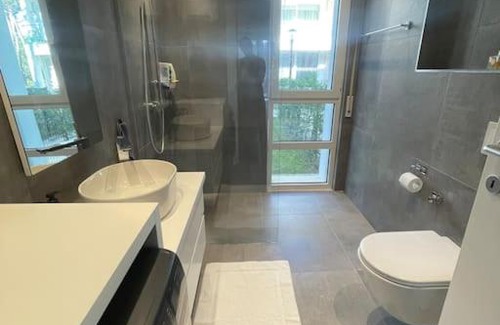 Ishem Apartment | Luxury ground floor Apt with garden - Bay of Lalzi