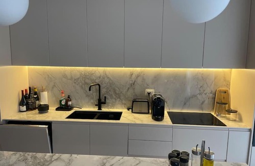 Ishem Apartment | Luxury ground floor Apt with garden - Bay of Lalzi