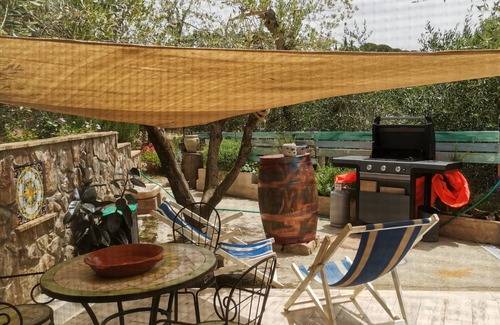 Orbetello Cottage | Magnificent cottage surrounded by olive trees and aromatic plants.