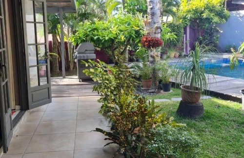 Punaauia House | Maison d'invités dans jardin tropical avec piscine à Tahiti