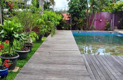 Punaauia House | Maison d'invités dans jardin tropical avec piscine à Tahiti