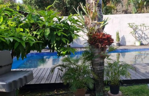 Punaauia House | Maison d'invités dans jardin tropical avec piscine à Tahiti