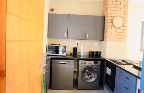 Greater Johannesburg Metropolitan Area Apartment | Mall of Africa Eazy Apartment