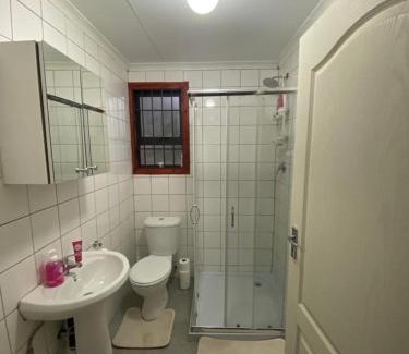 Greater Johannesburg Metropolitan Area Apartment | Man and Dog Log Cabin