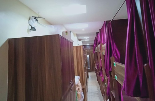 Vile Parle East Hotel | Millano Dormitory