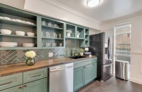 Junius Heights Condo | Modern 2BR, 2BA luxury condo in central Dallas with private patio, designer interiors, and access to award-winning courtyard retreat.