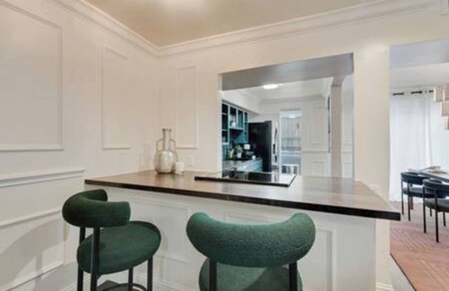 Junius Heights Condo | Modern 2BR, 2BA luxury condo in central Dallas with private patio, designer interiors, and access to award-winning courtyard retreat.