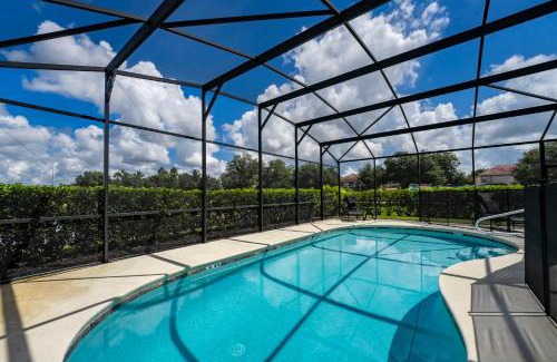 Davenport House | Modern 5BD, 4BA pool home in a golf resort community of Providence