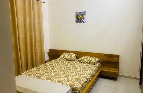 Emirates City Apartment | Modern comforts of 311 to Dubai