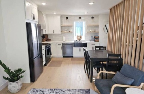 Genesee House | Modern new home w/water views