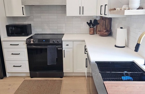 Genesee House | Modern new home w/water views