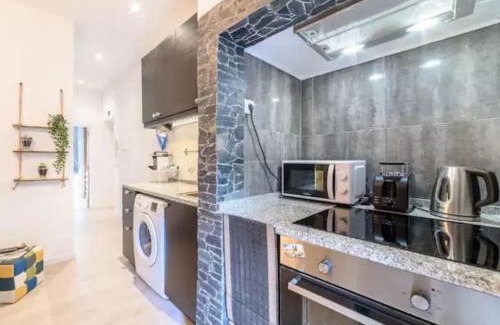 Penha de Franca Apartment | Modern Rustic Apartment in Graça