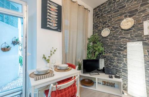 Penha de Franca Apartment | Modern Rustic Apartment in Graça