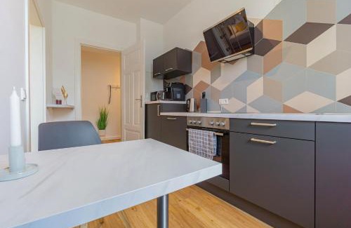 Cottbus Apartment | modernes Apartment - zentral, ruhig, Wlan, Netflix, Küche, Schreibtisch, Parkplatz, Waschtrockner