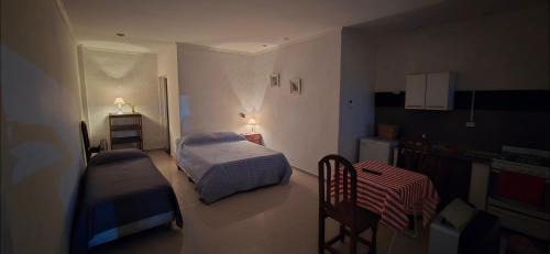 Yerba Buena Apartment | Mono Pringles YB Planta Baja Parking
