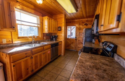 Sevierville Cabin | Mountain-View Family Retreat. Game Rooms, Hot Tub & Pet Friendly.