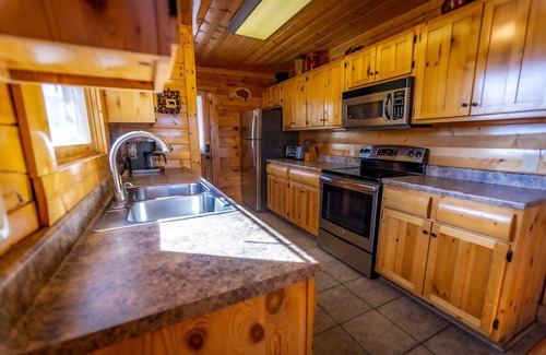Sevierville Cabin | Mountain-View Family Retreat. Game Rooms, Hot Tub & Pet Friendly.
