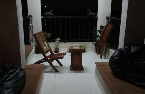 Aarey Colony Apartment | Nature deck lake view room