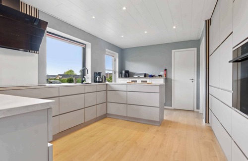 Hvalpsund Villa | Near beach and golf, with multi-purpose room.