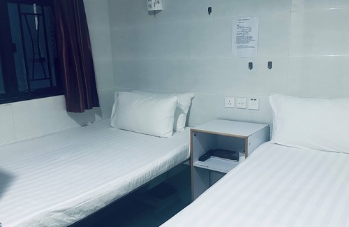 Tsim Sha Tsui House | NEW COSMOS GUEST HOUSE