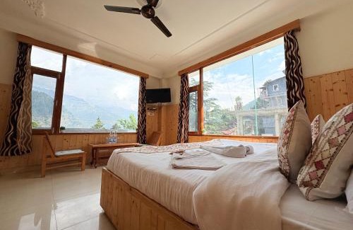 Manali Hotel | New Suraj Inn - Nestled near Hidimba Temple ! Rooftop Cafe With Hampta View ! Private Parking