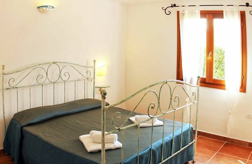 Tanaunella Apartment | Nice apartment for 4 people with pool, WIFI, A/C, TV, terrace, pets allowed and parking