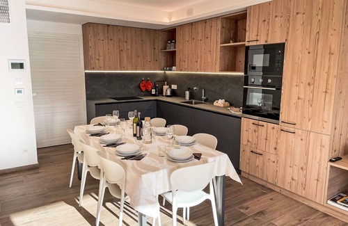 Bianzone House | Nice apartment in villa for 8 guests with WIFI, A/C, TV, terrace and pets allowed