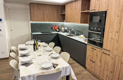 Bianzone House | Nice apartment in villa for 8 guests with WIFI, A/C, TV, terrace and pets allowed