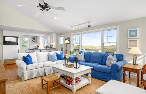 Sagamore Beach House | Oceanfront at Sagamore Beach with clean, crisp, Cape Cod interior and coastal furnishings