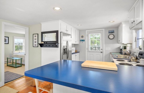 Sagamore Beach House | Oceanfront at Sagamore Beach with clean, crisp, Cape Cod interior and coastal furnishings