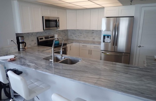 Redington Shores Condo | Oct/Nov/Dec dates Avail! BEACHFRONT CORNER 2/2 w/Jacuzzi and Electric FP!