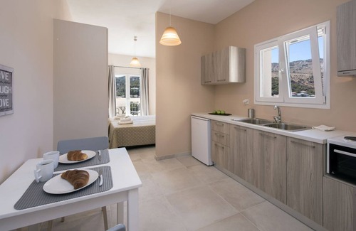 Kassiopi Apartment | One-bedroom apartment with a view of the sea